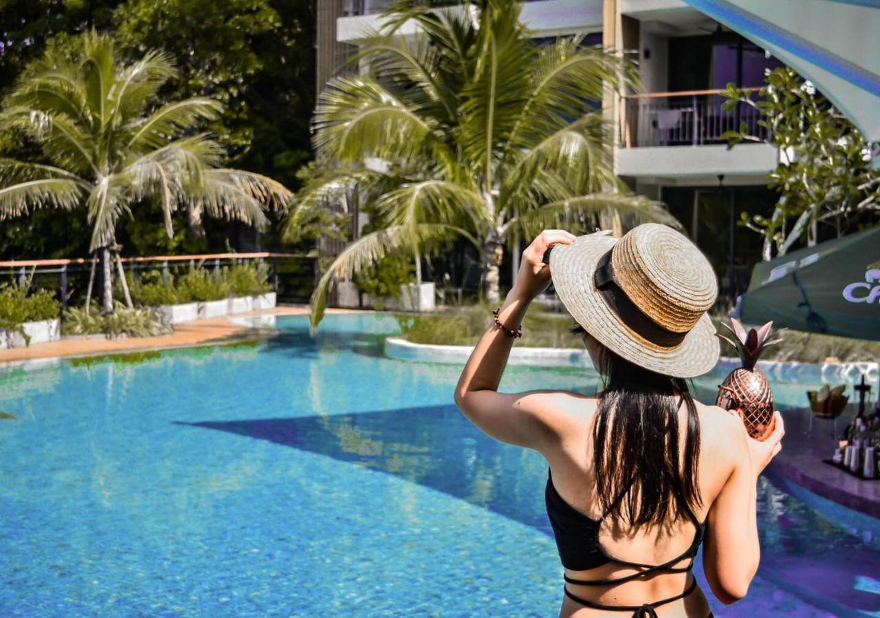 Skyview Resort Phuket Patong Beach Kültér fotó A woman at a pool