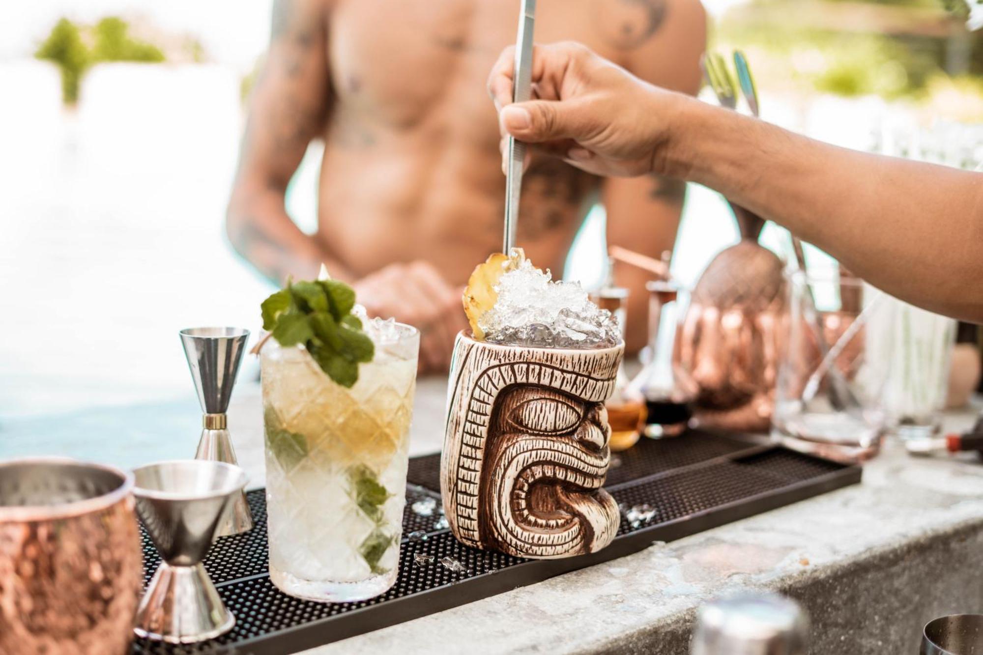 Skyview Resort Phuket Patong Beach Kültér fotó A tiki drink being stirred